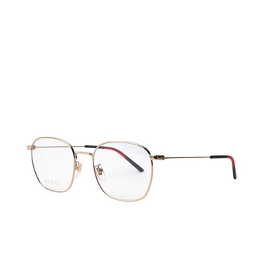 Gucci GG0681O Korrektionsbrillen 004 gold - Dreiviertelansicht