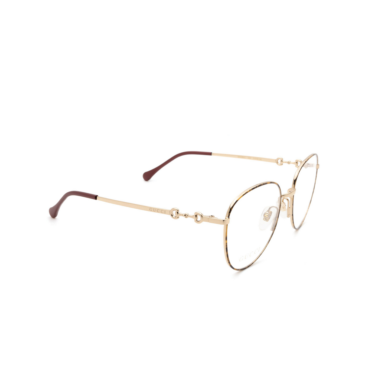 Gucci® Round Eyeglasses: GG0880O color Gold / Havana 002 - 2/3.