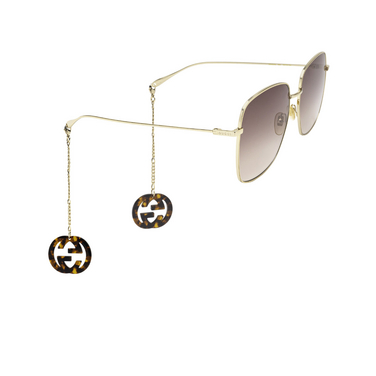 Gucci GG1031S Sunglasses 003 gold - three-quarters view