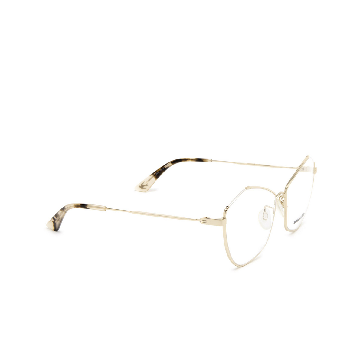 Alexander McQueen® Irregular Eyeglasses: MQ0262O color 003 Gold - three-quarters view