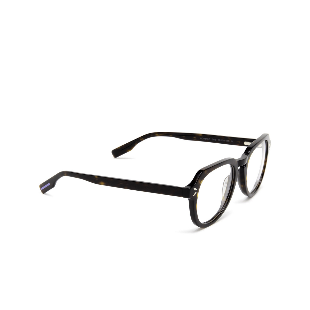 Alexander McQueen® Round Eyeglasses: MQ0348O color 002 Dark Havana - three-quarters view