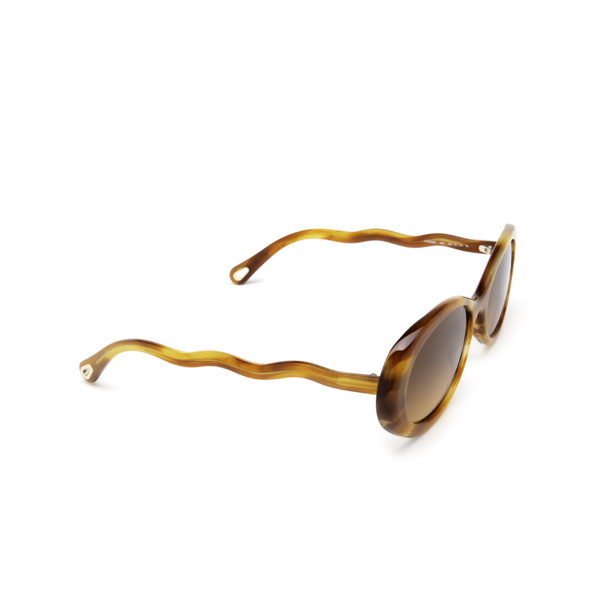 Chloé® Oval Sunglasses: Zelie Oval CH0088S color Havana 002 - three-quarters view.