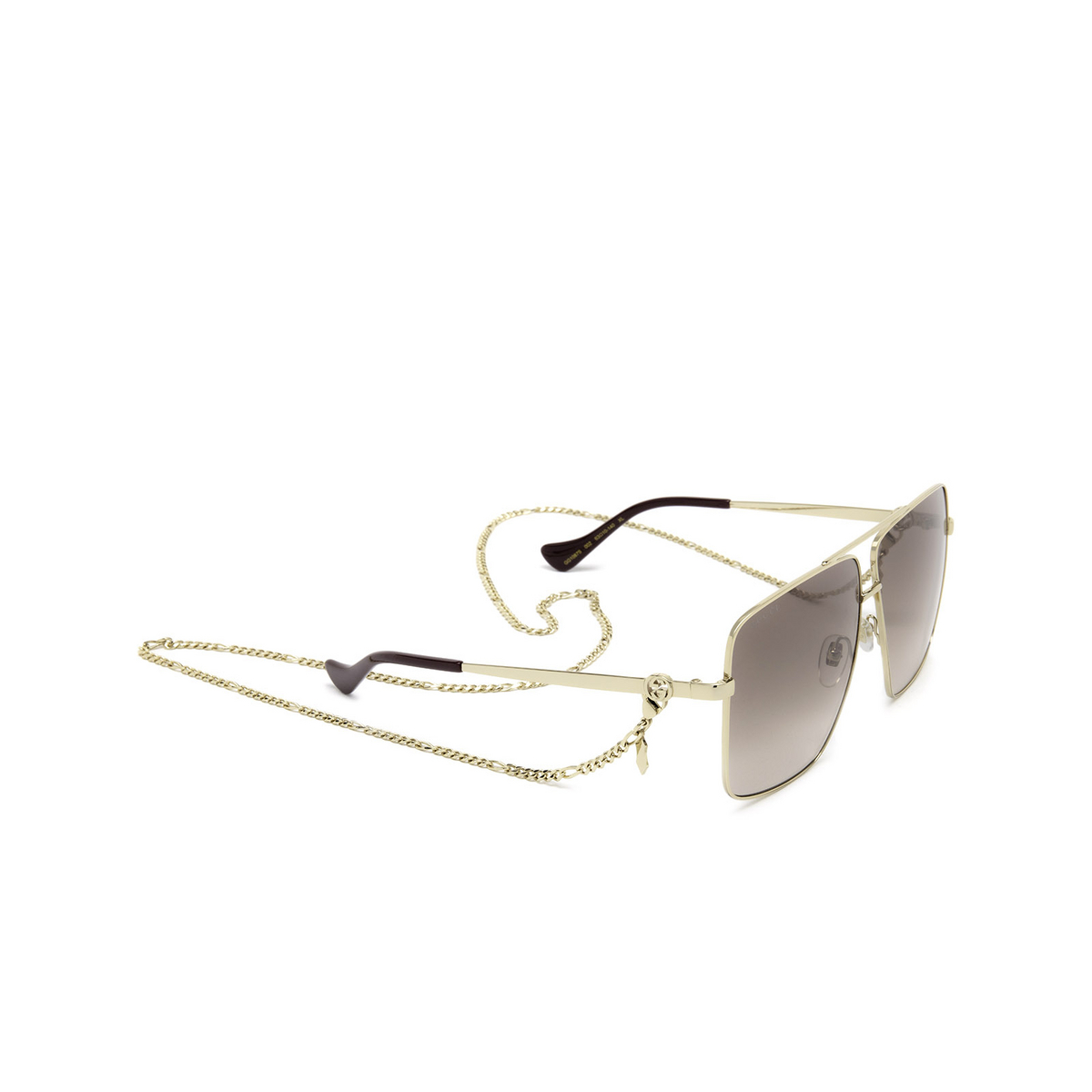 Gucci® Irregular Sunglasses: GG1087S color Gold 002 - three-quarters view.