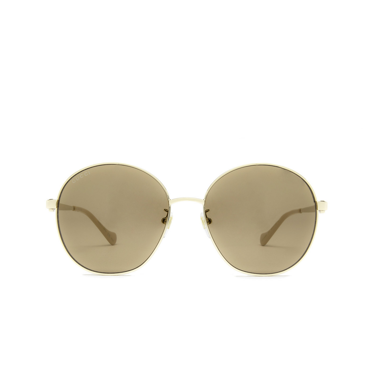 Gucci® Round Sunglasses: GG1090SA color Gold 003 - front view.