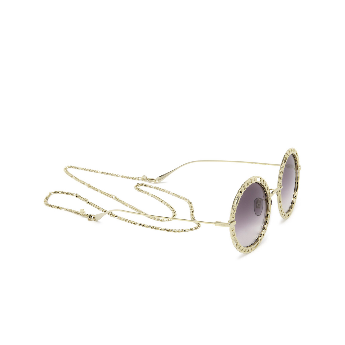Gucci® Round Sunglasses: GG1113S color Gold 002 - three-quarters view.