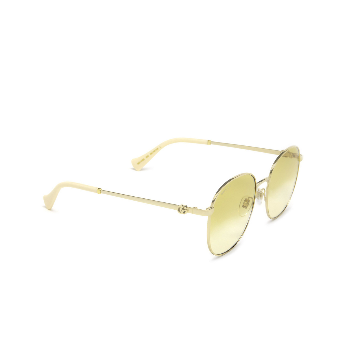 Gucci® Round Sunglasses: GG1142S color Gold 003 - three-quarters view.