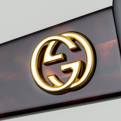 Gafas de sol con logotipo de G entrelazada de Gucci