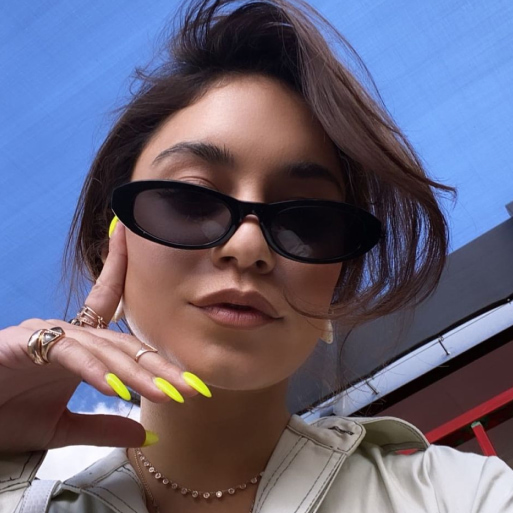 Vanessa Hudens in oval sunglasses