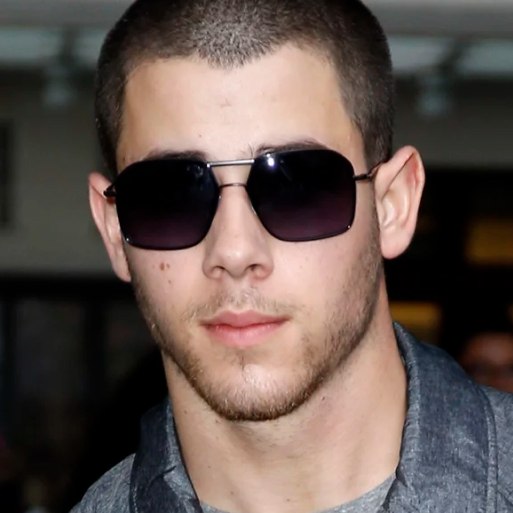 Nick Jonas in aviator shades