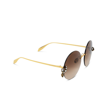 Alexander McQueen AM0418S Sunglasses 002 gold - three-quarters view