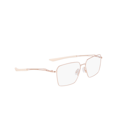 Nike 8214 Eyeglasses 780 shiny rose gold - three-quarters view