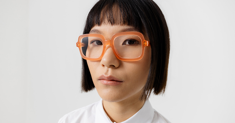 Woman wearing glasses with anti-reflective lenses