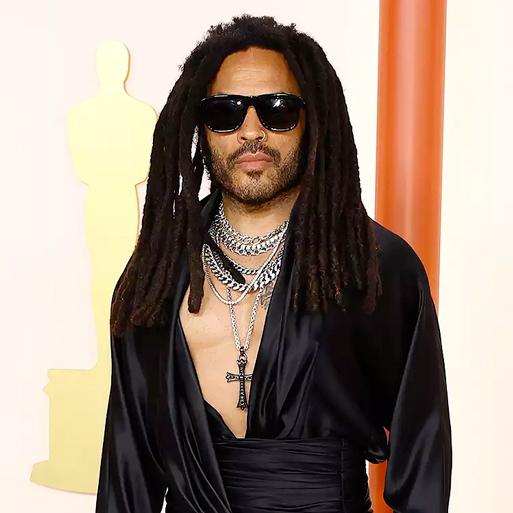 Lenny Kravitz wear’s Saint Laurent’s SL 588 sunglasses at the 95th Annual Academy Awards.